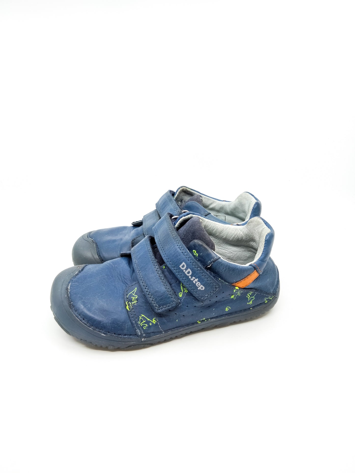Siniset dinosauruskuvioiset kengät